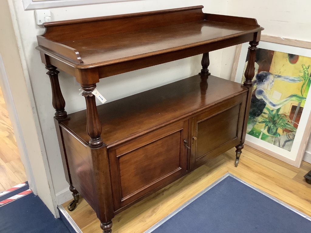 A Victorian mahogany dumb waiter with cupboard below